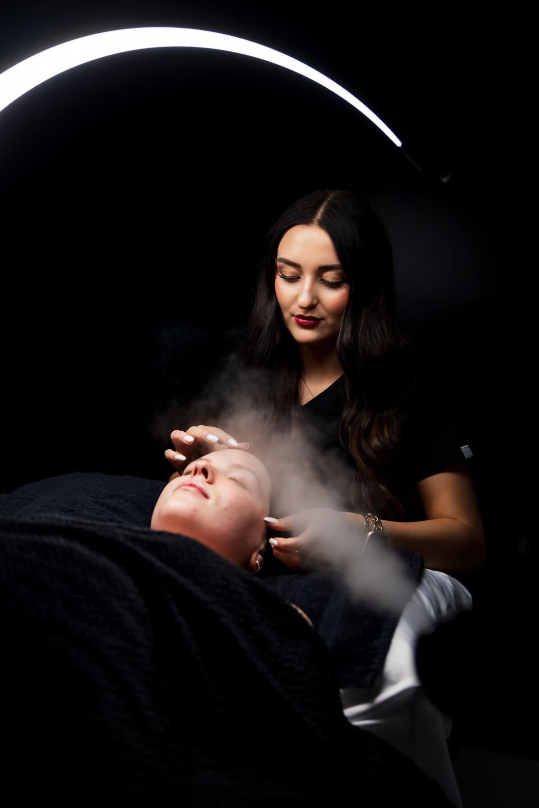 Facial treatment under a ring light